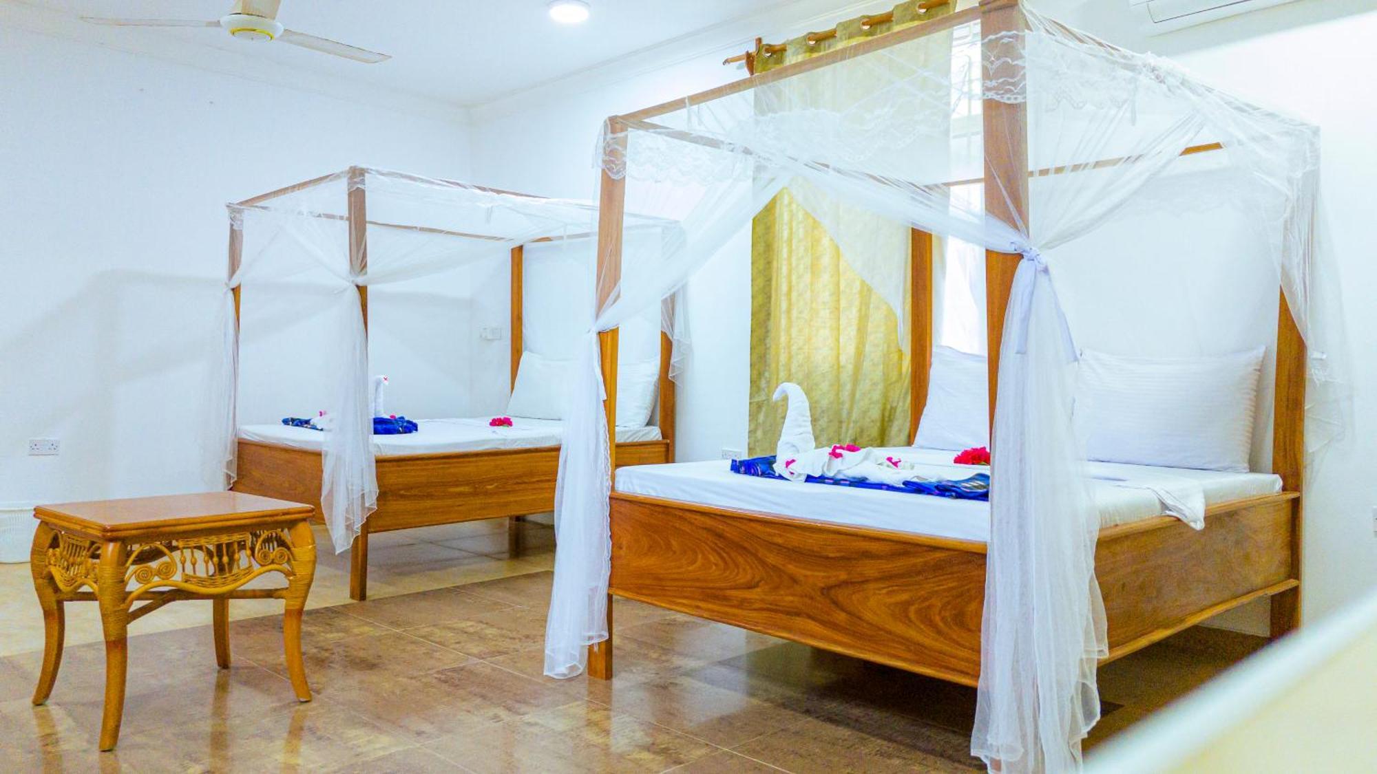 Sands Inn Hotel Pwani Mchangani Esterno foto